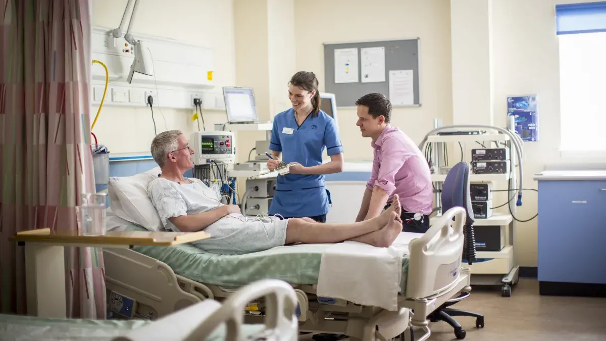 Nurse and consultant talking to participant