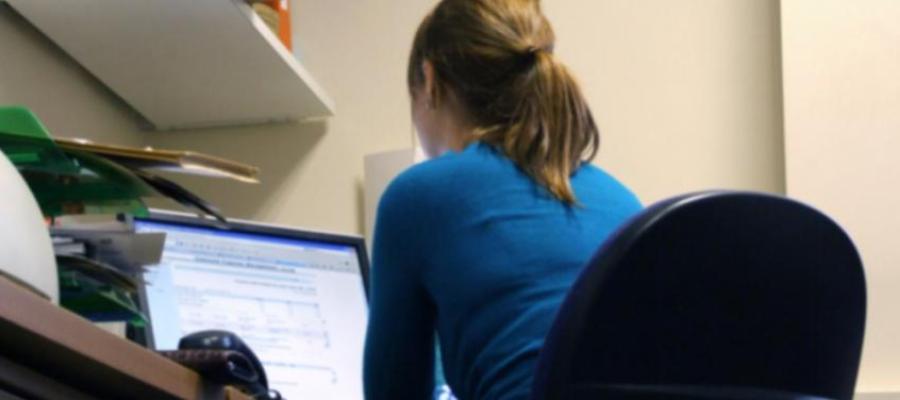  a researcher working with a computer