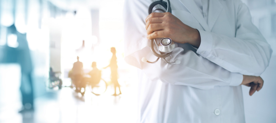 A doctor holding a stethoscope